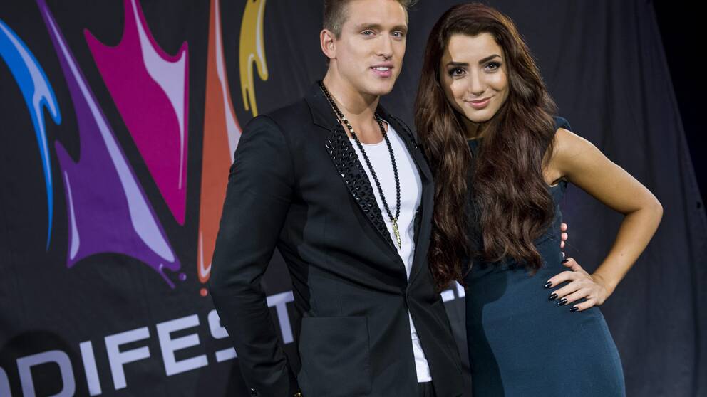 Foto: Claudio Bresciani/Scanpix Danny Saucedo och Gina Dirawi, programledare för Melodifestivalen 2013.
