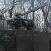 En rysk stridsvagn och en man i kostym