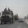 Kurdiska Peshmerga lämnar staden Kirkuk, staden faller till irakiska armen som tar kontroll.