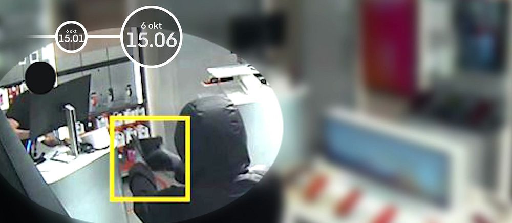 Säkerhetskamerabild av en huvad person vid en butikskassa. Tiden visas som 15.06.