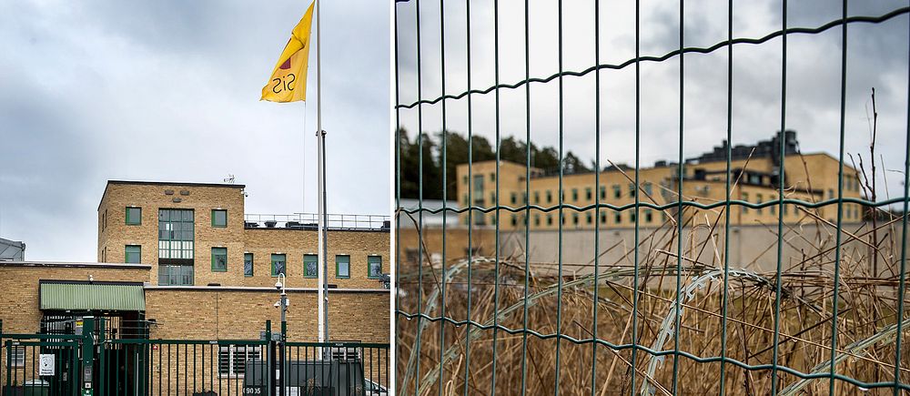 En byggnad bakom stängsel och taggtråd med en flaggstång