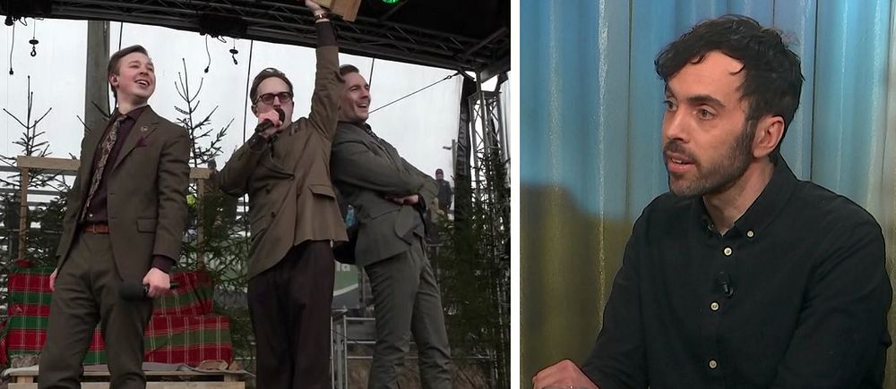 KAJ håller upp vinststatyett (höger), journalisten Jens Finnäs (vänster)