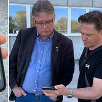 Hudiksvalls kommunalråd Mikael Löthstam (S) tittar på ett mobilklipp på näringsministern Ebba Busch., tillsammans med reporter från SVT