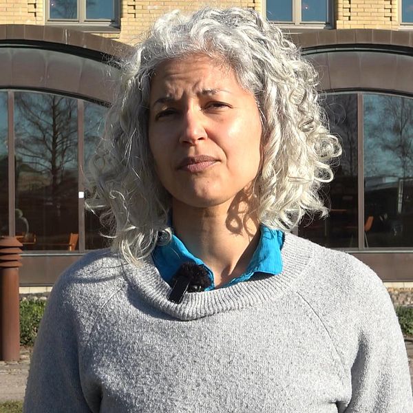 Porträttbild på kvinna och läkemedelshandel