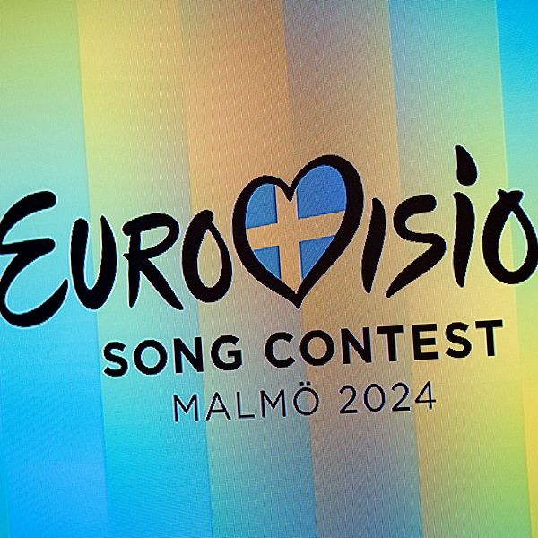 Eurovision logo and right Conchita Vorst