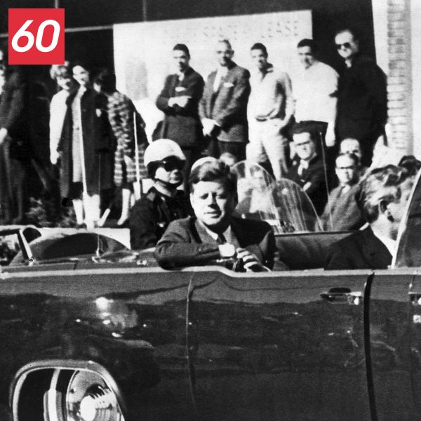 John F. Kennedy minuter från att mördas i Dallas, Texas, 1963.