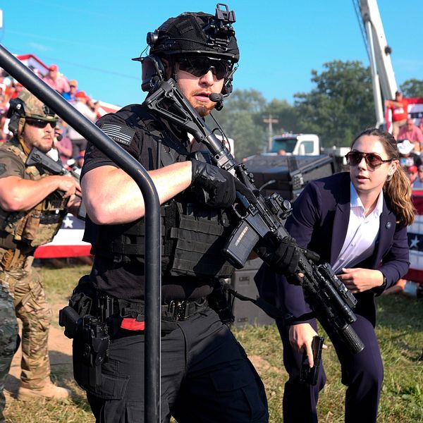 Security men after the shooting.