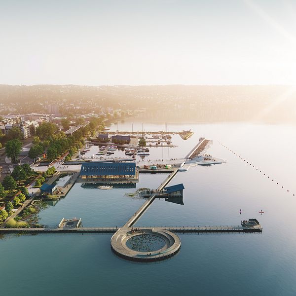 Förslag på hur hamnpiren i Jönköping kan se ut. Bilden är från ovan och visar en lång pir som går ut i vattnet, med en stor byggnad i mitten.
