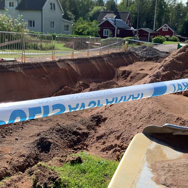 Polisavspärrning vid en grävplats.