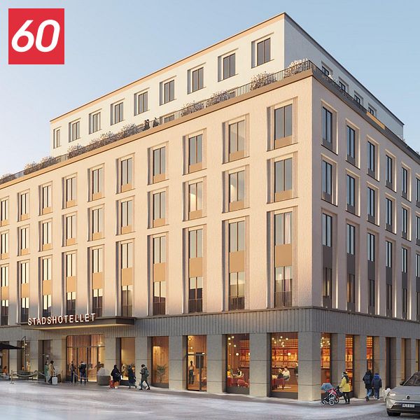 Nybyggt hotell med modern arkitektur i stadsmiljö en vintrig dag.