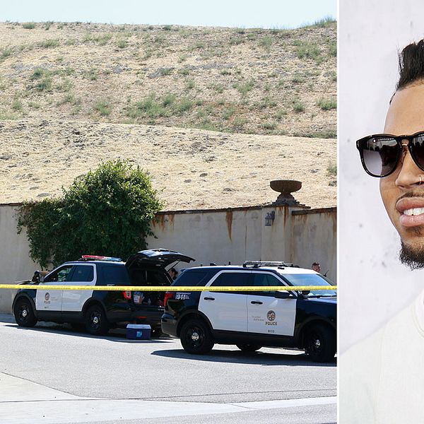 Chris Brown är omringad av polis utanför sitt hem i San Fernando Valley, Los Angeles.