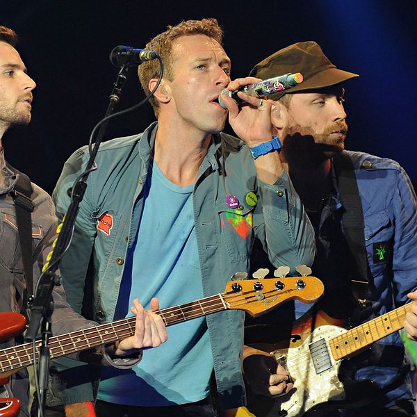 Guy Berryman, Chris Martin och Jonny Buckland från Coldplay.