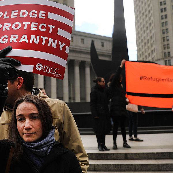 Aktivister i New York protesterar mot flyktingstoppet.