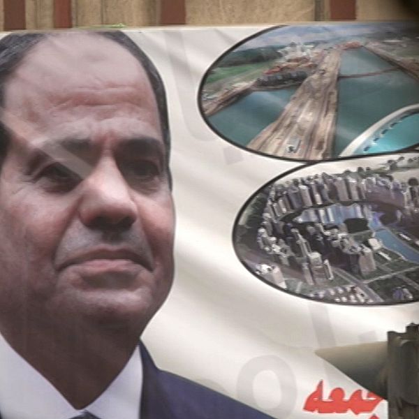 Affisch med el-Sisis porträtt.