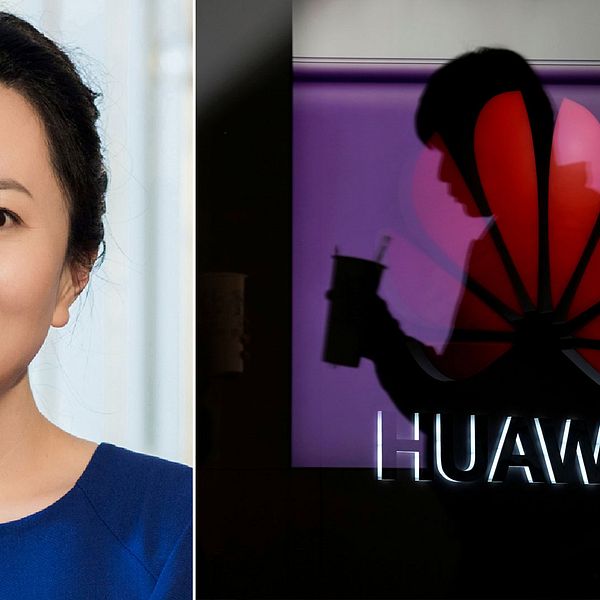 Huaweis finanschef Meng Wanzhou och en man framför företagets logotyp