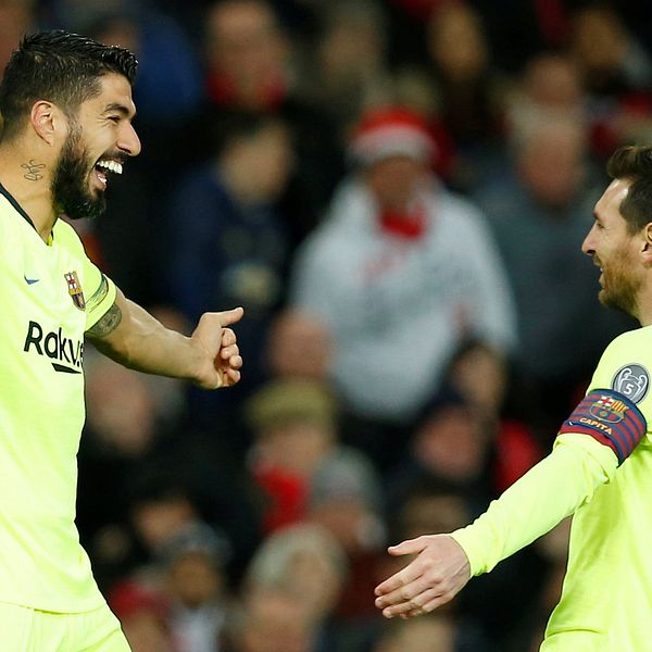 Luis Suarez och Leo Messi jublar efter Barcelonas 1-0-mål.