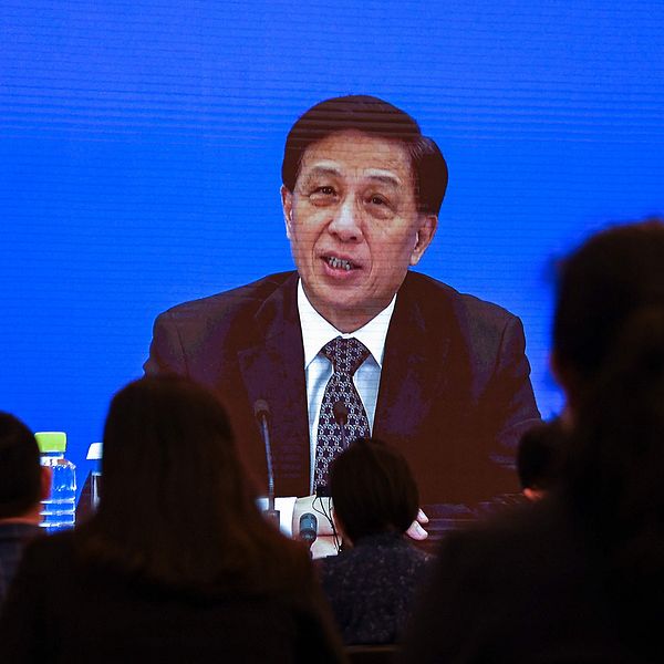 Zhang Yesui, talesperson på Nationella folkkongressen i Folkrepubliken Kina, talar på en presskonferens på videolänk.
