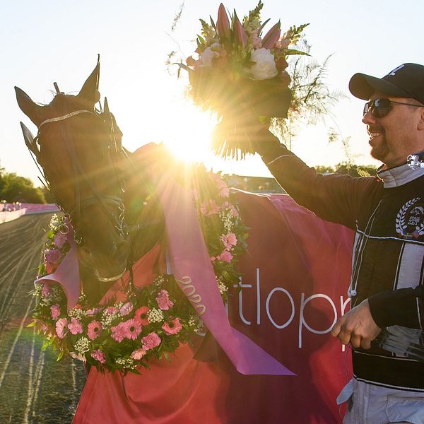 Trainer Daniel Redén of Sweden and horse Propulsion celebrate after winning the Elitloppet final trotting race on May 31, 2020 in Stockholm.