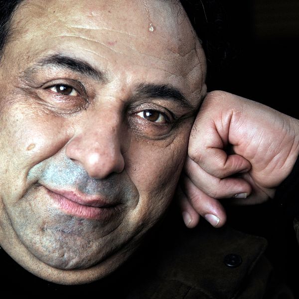 Porträtt på skådespelaren Hassan Birjany.