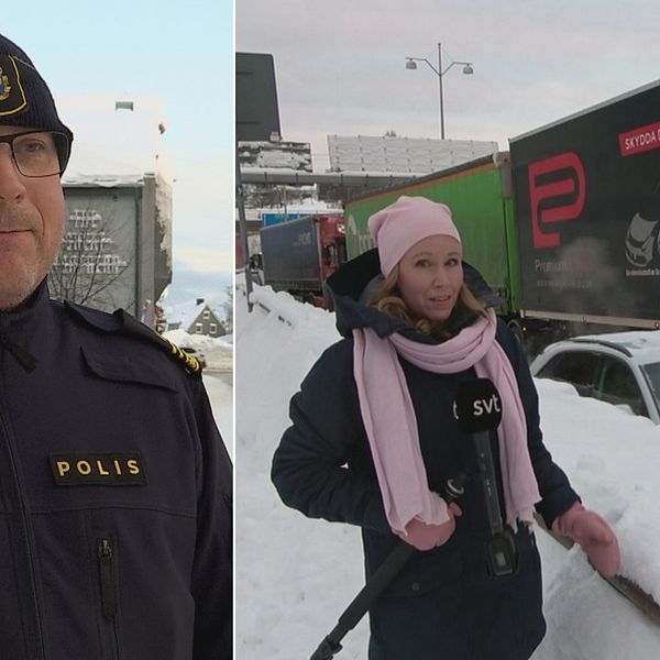 man i polisuniform, samt kvinnlig reporter vid snövall på gata med lastbilar