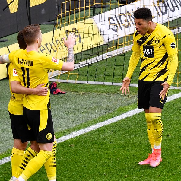 Jadon Sancho (till höger) är klar för Manchester United.