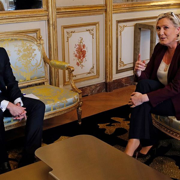 President Emmanuel Macron och Nationell samlings Marine Le Pen
