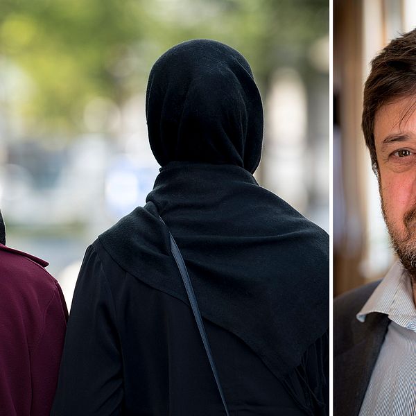 Två kvinnor iklädda hijab fotade bakifrån. Isak Reichel.