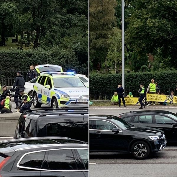 Polis ingriper mot personer i gröna västar som limmat fast sig på en väg.