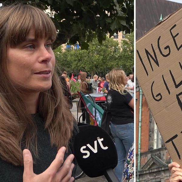 Kvinna som står till höger och pratar till mikrofon. Skylt till vänster där det står ”ingen gillar en tjallare”