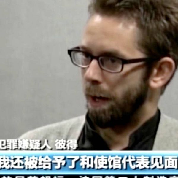 Den gripne mr-aktivisten Peter Dahlin på statlig kinesisk tv, där han erkänner att han brutit mot lagen. Frågan är hur frivillig bekännelsen var. Arkivbild.