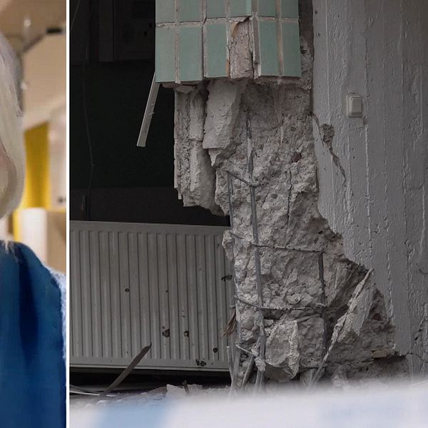 Kvinna till vänster i bild, till höger trasig vägg med löst murbruk