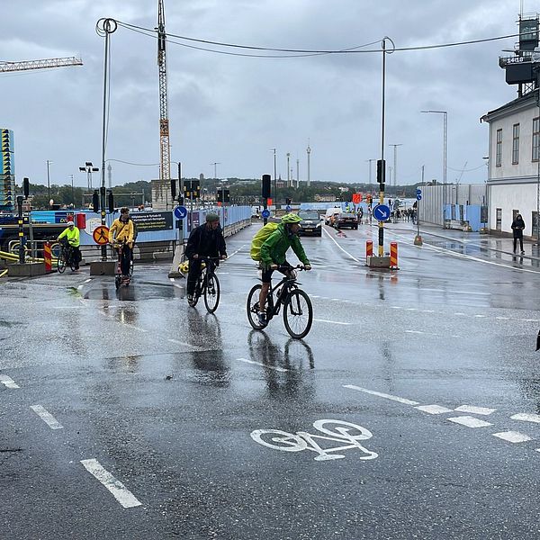 Cyklister vid Slussen.