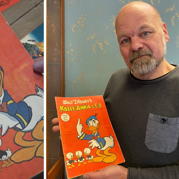 En man håller upp en Kalle Anka-tidning från 1948
