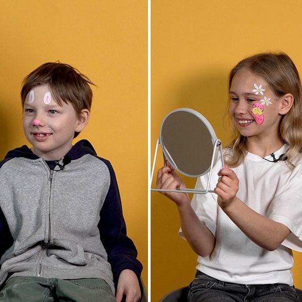 Theo, Elliot och Elise med ansiktsmålningar.