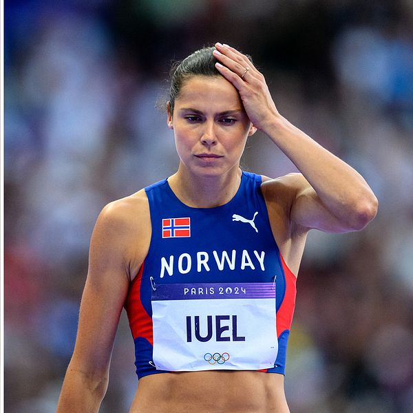 Kajsa Bergqvist och Amalie Iuel vid friidrottsevenemang, Bergqvist i vardagskläder, Iuel i tävlingsdräkt.