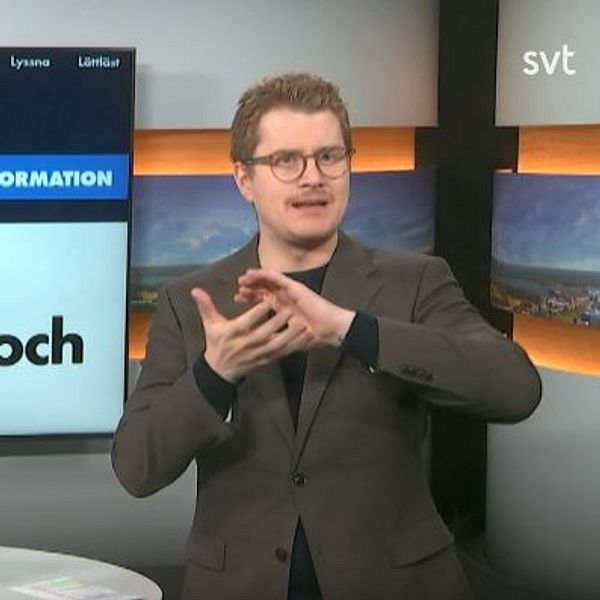 Programledaren tecknar ordet ”kris”