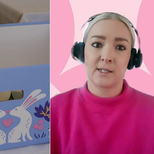 Kelan perhe-etuuksien suunnittelija Anniina Kuokka kirkkaan pinkissä puserossa ja avattu äitiyspakkaus