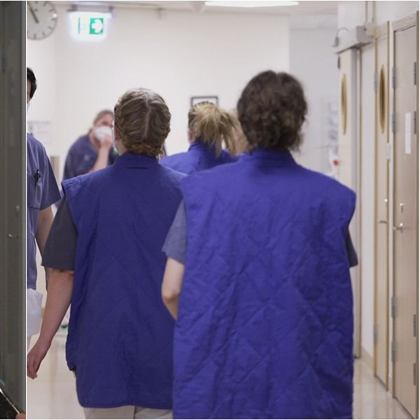 Sjuksköterskor vandrar i korridor