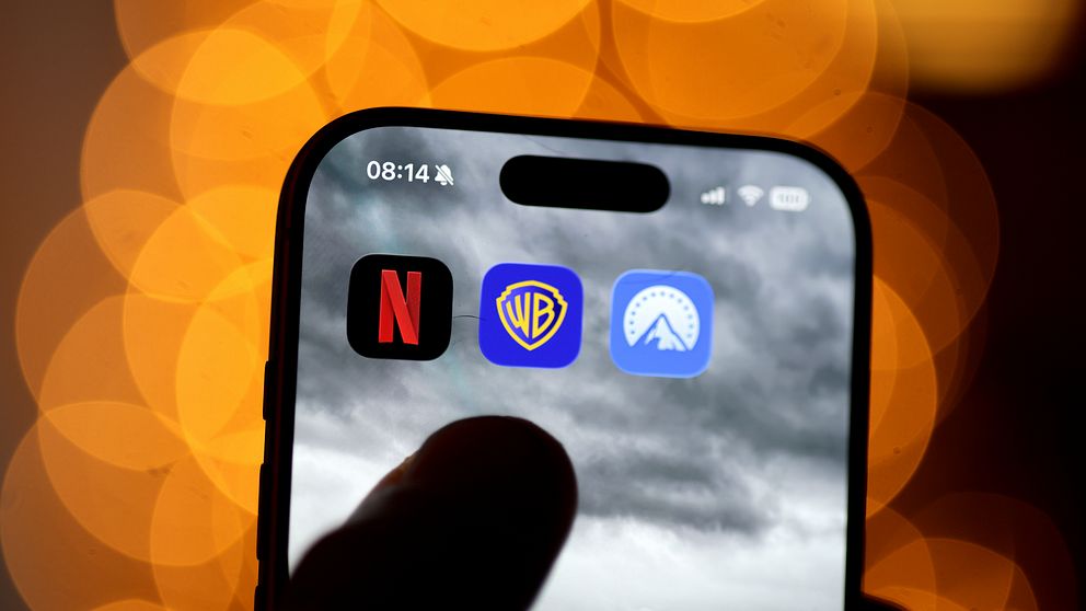 Appikoner för Netflix, Warner Bros. och HBO på en mobilskärm.