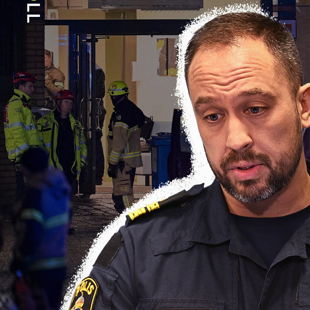 En brandman i skyddsutrustning står utanför ingången till Komvux Campus Risbergska i Örebro, omgiven av kollegor och räddningspersonal.
