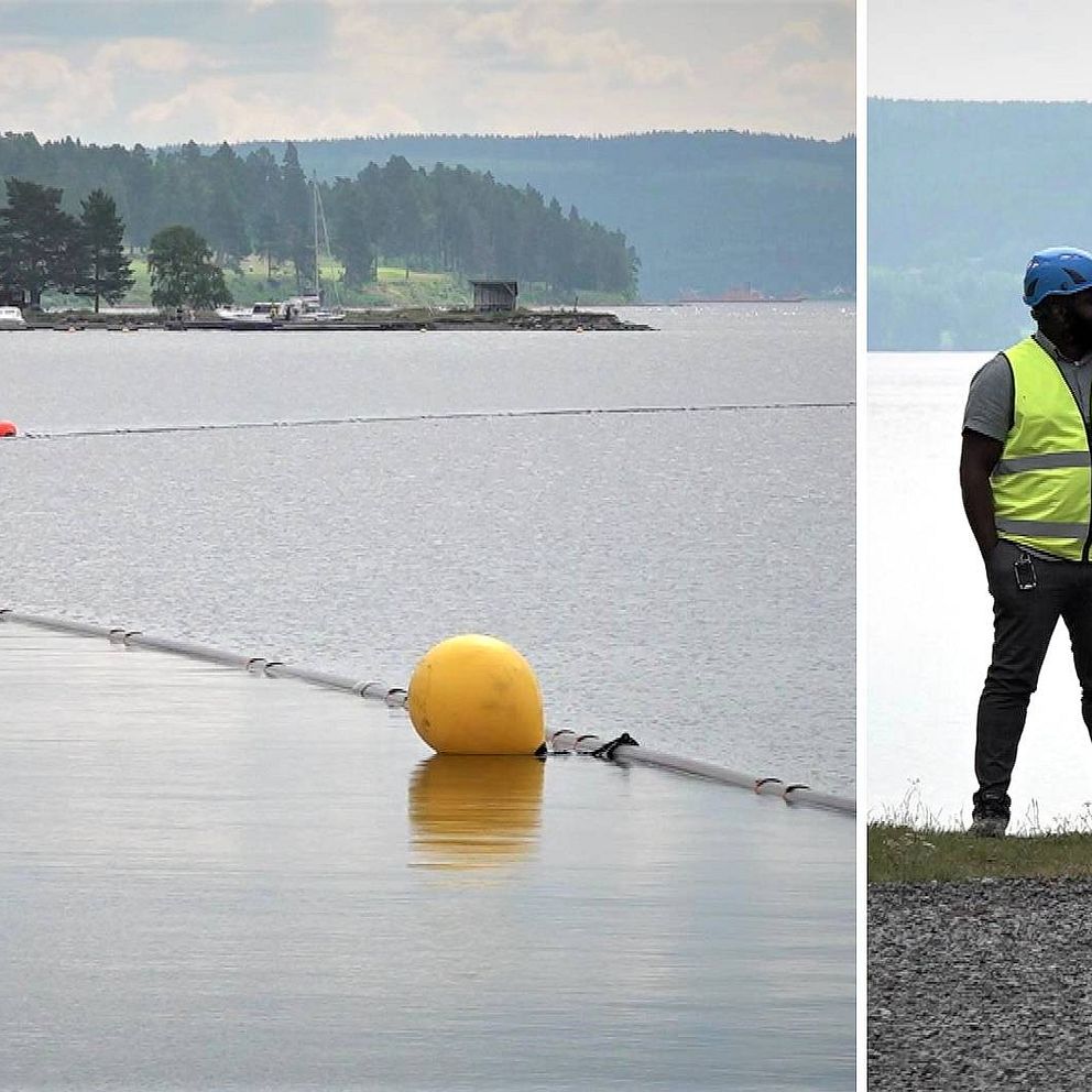 Vattenledningar som flyter i vattenytan, förankrad vid stora bojar. Småbåtshamn syns på andra sidan sjön.