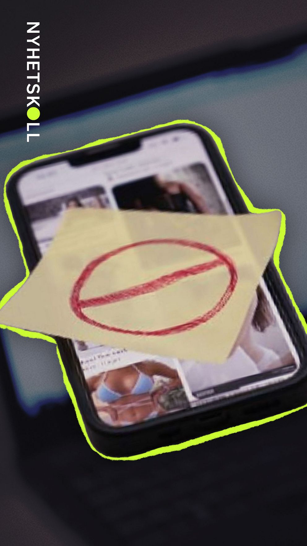 Smartphone med bildskärm där en postit-lapp täcker skärmen med en förbudssymbol.