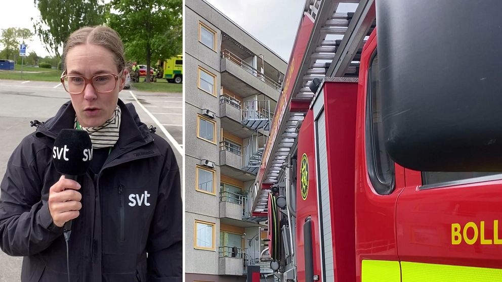 reporter står till vänster, utomhus med mikrofon. Till höger syns fel av en brandbil och bakom ett flervåningshus.