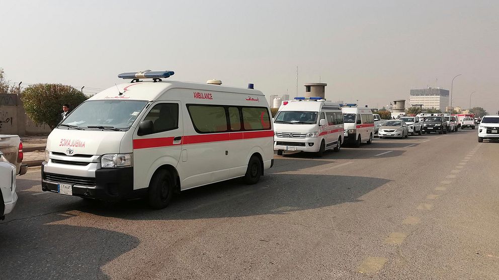 Ambulanser utanför PMF-högkvarteret i Bagdad.