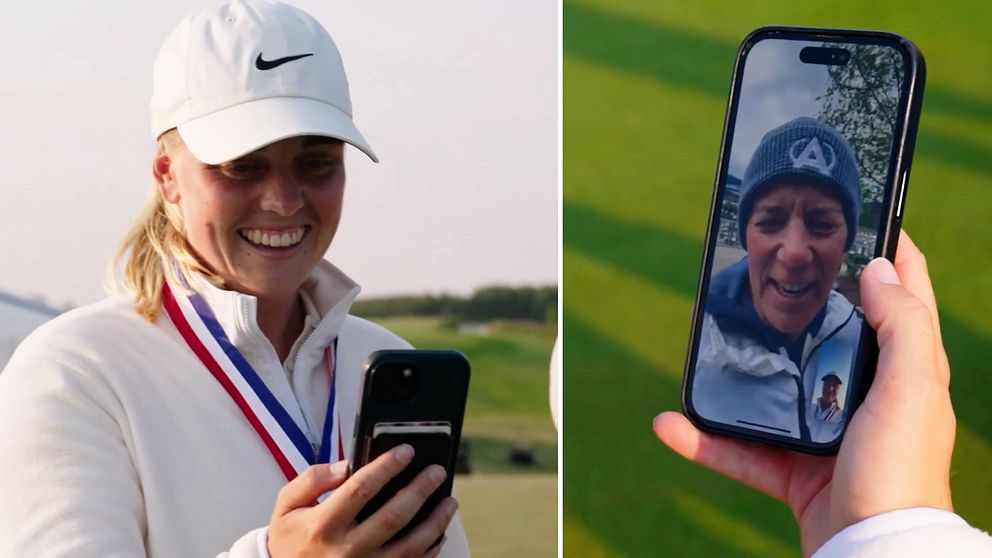 Person med medalj håller mobil, videosamtal visas på närbild av telefonens skärm.