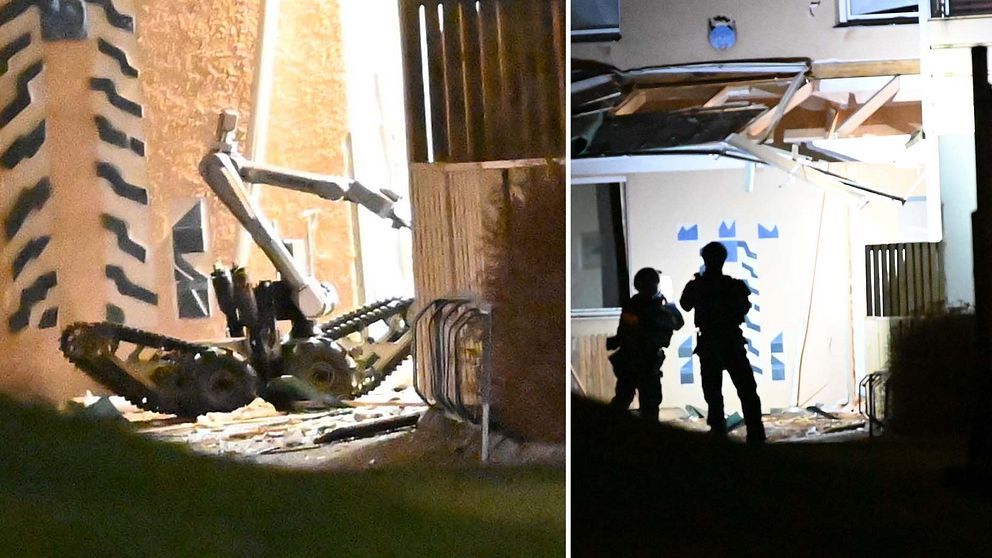 Polisens bombrobot arbetar vid en entré till ett lägenhetshus i Borås.