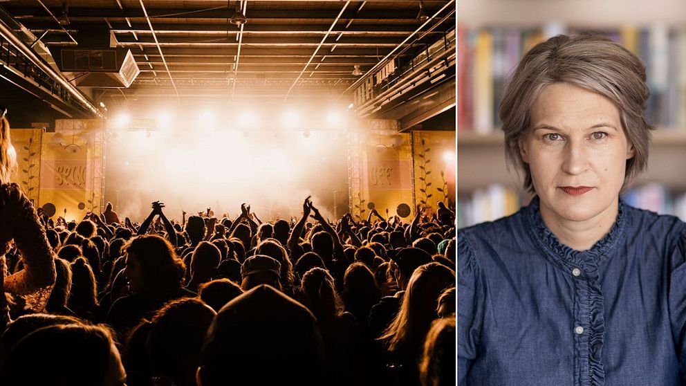 Besökare på en konsert i motljus.