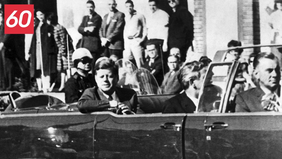 John F. Kennedy minuter från att mördas i Dallas, Texas, 1963.