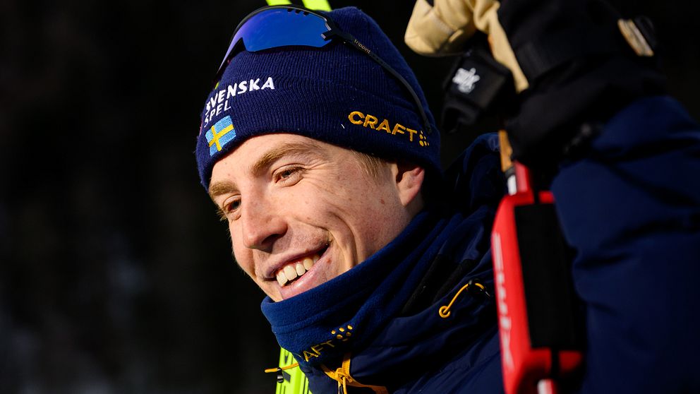 William Poroma i blå mössa och glasögon.