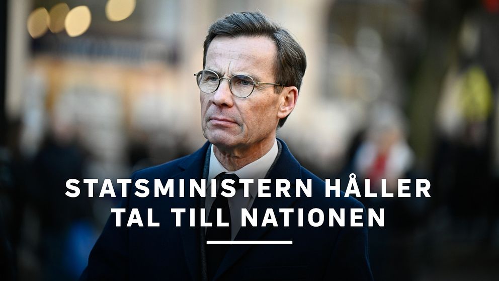 En man med kort hår och glasögon